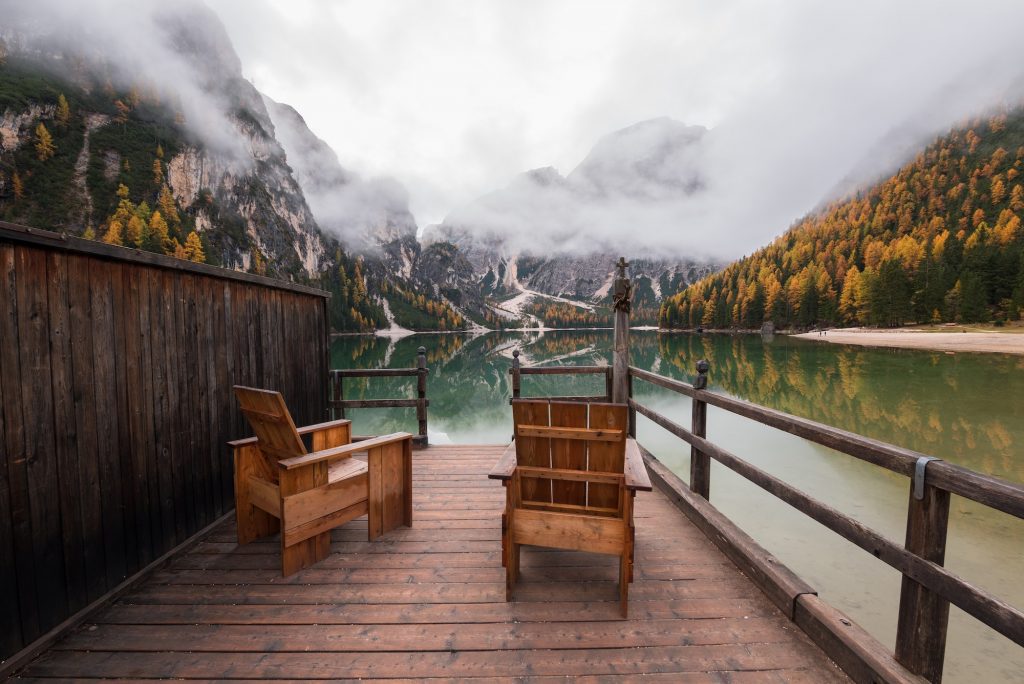 Moody autumn day in the Dolomites forest and mountains